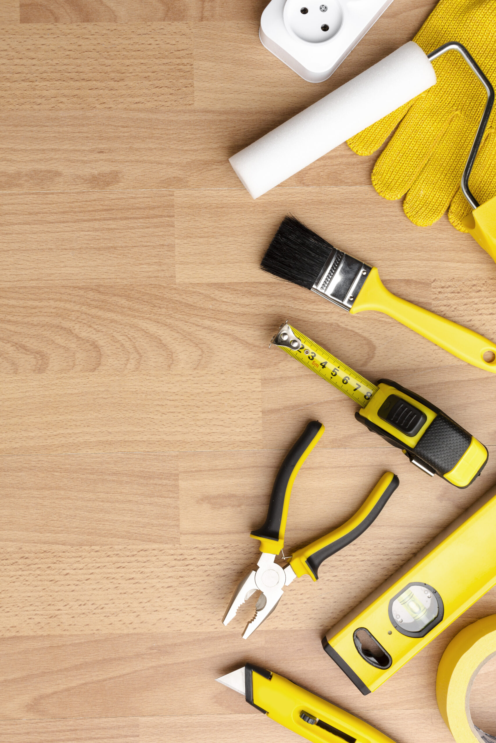 yellow-repair-kit-wooden-background